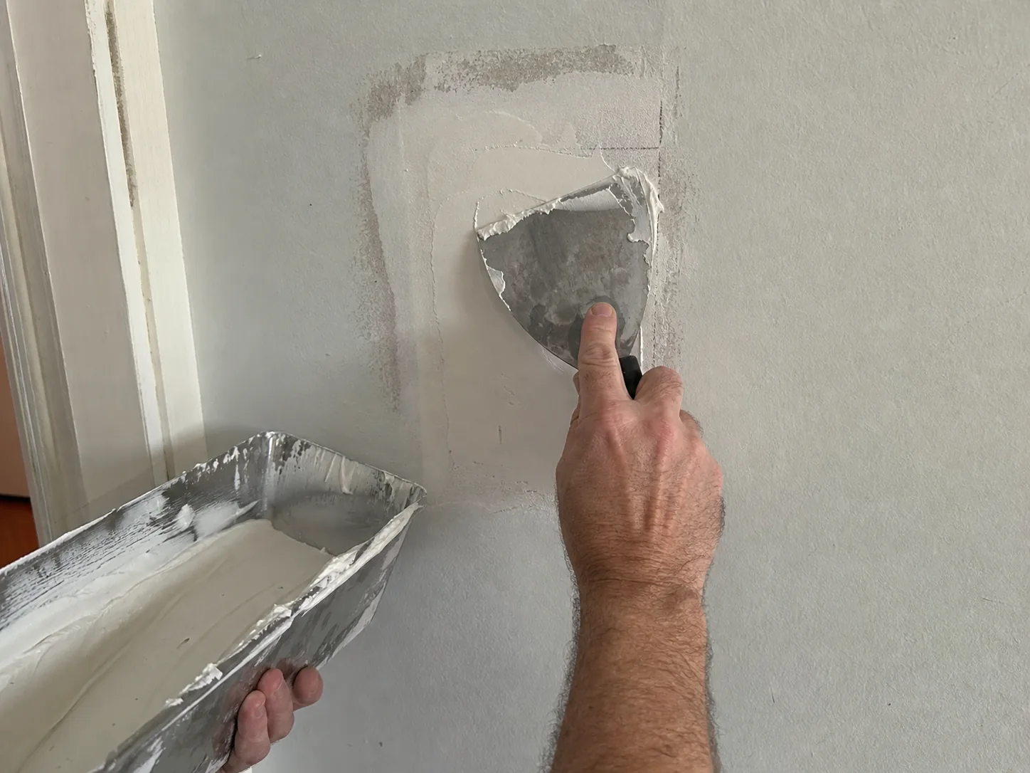 Drywall repair Wallingford Connecticut New Haven County wall patch compound application Luis Meriden